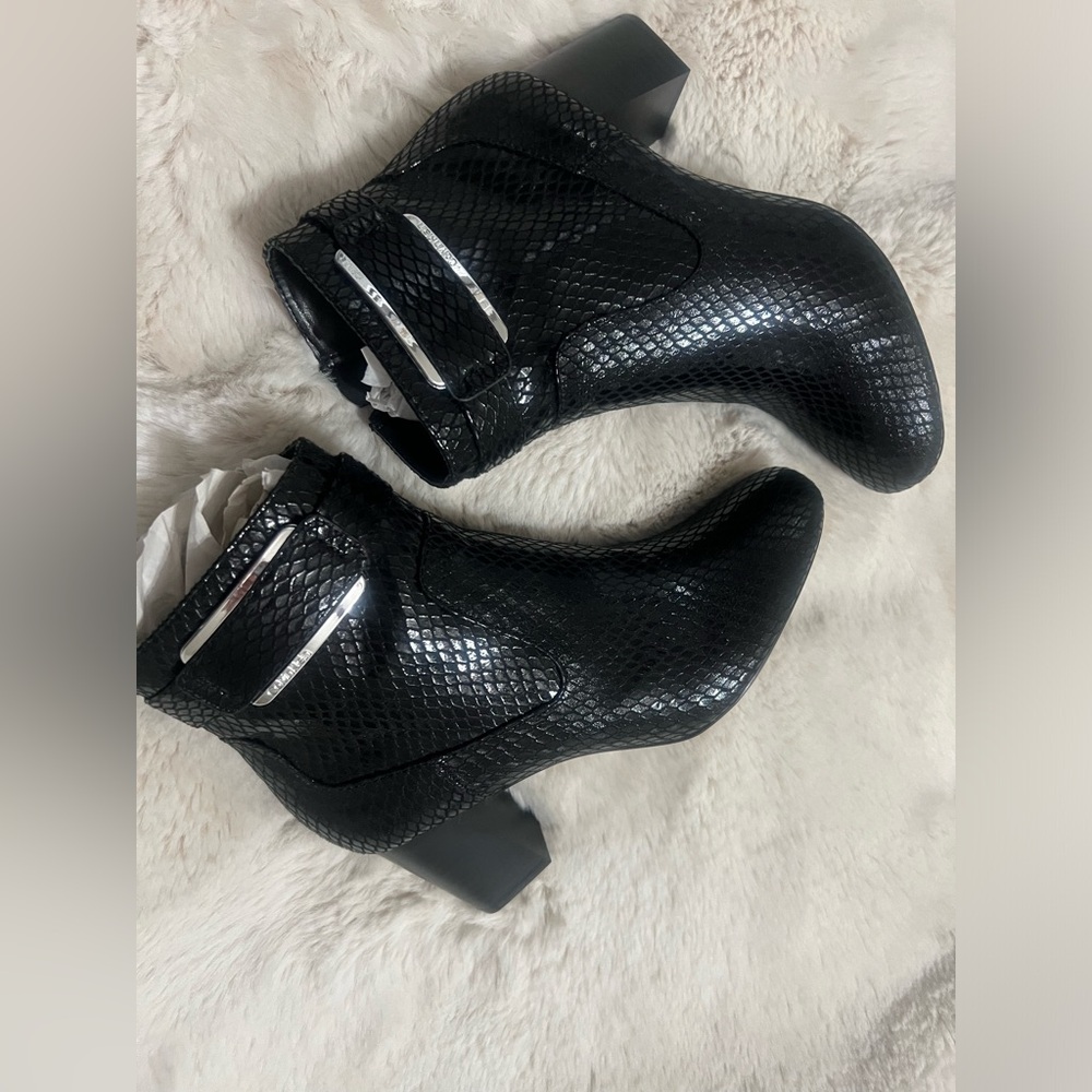Brand new Calvin Klein booties size 7